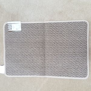 New throw mat beige trim colors are gray, tan with non-slip back w/ tags.